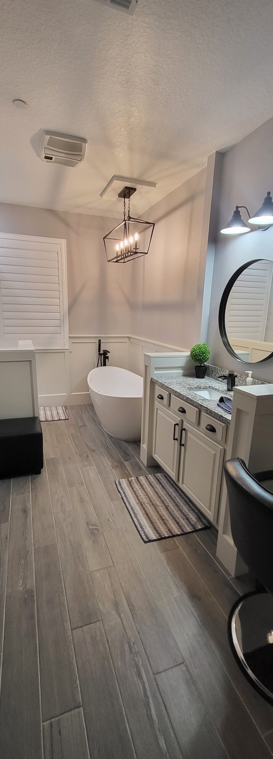 Finished bathroom renovation with freestanding tub