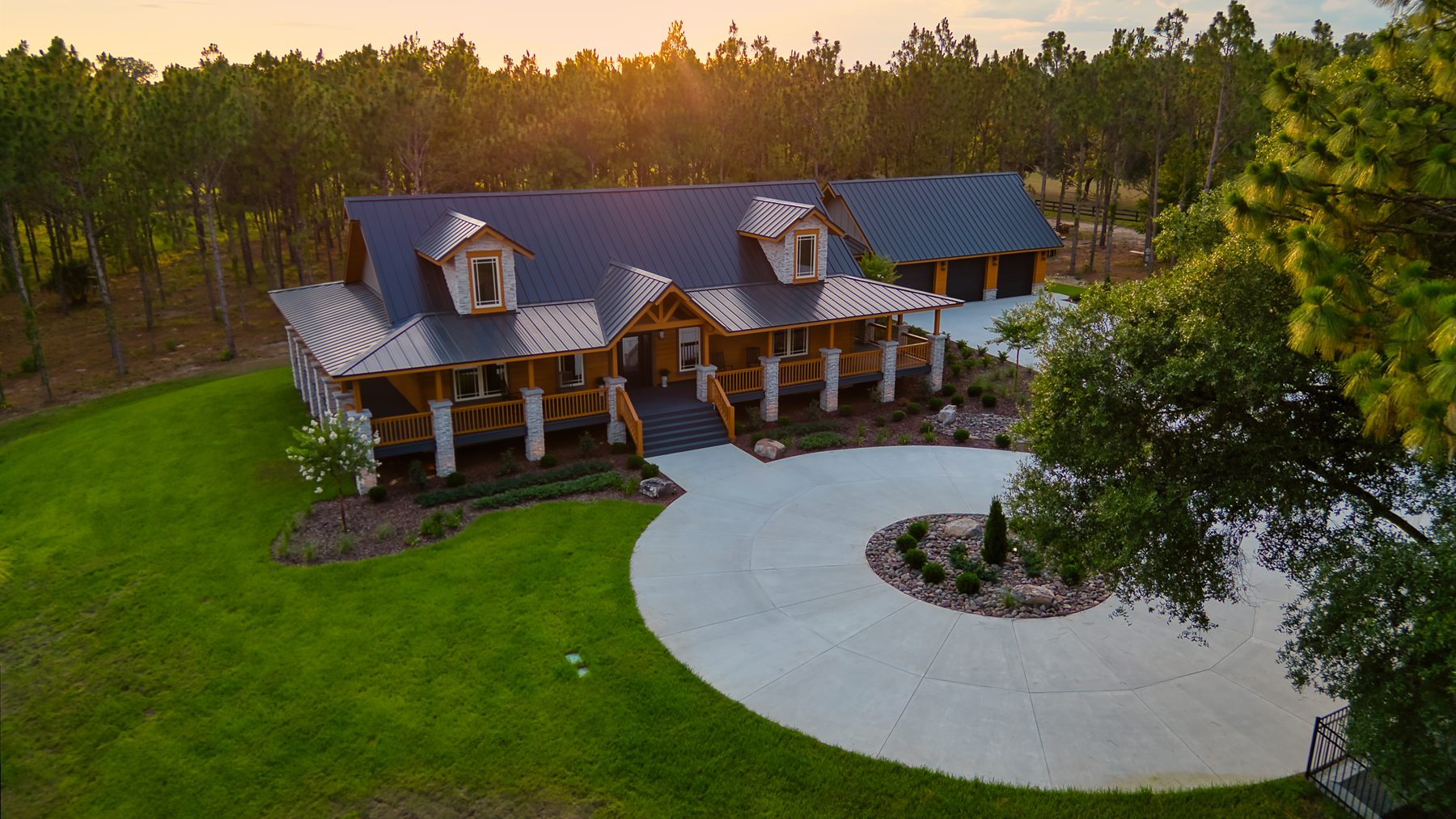 Custom log cabin exterior at sunset in Apopka Florida